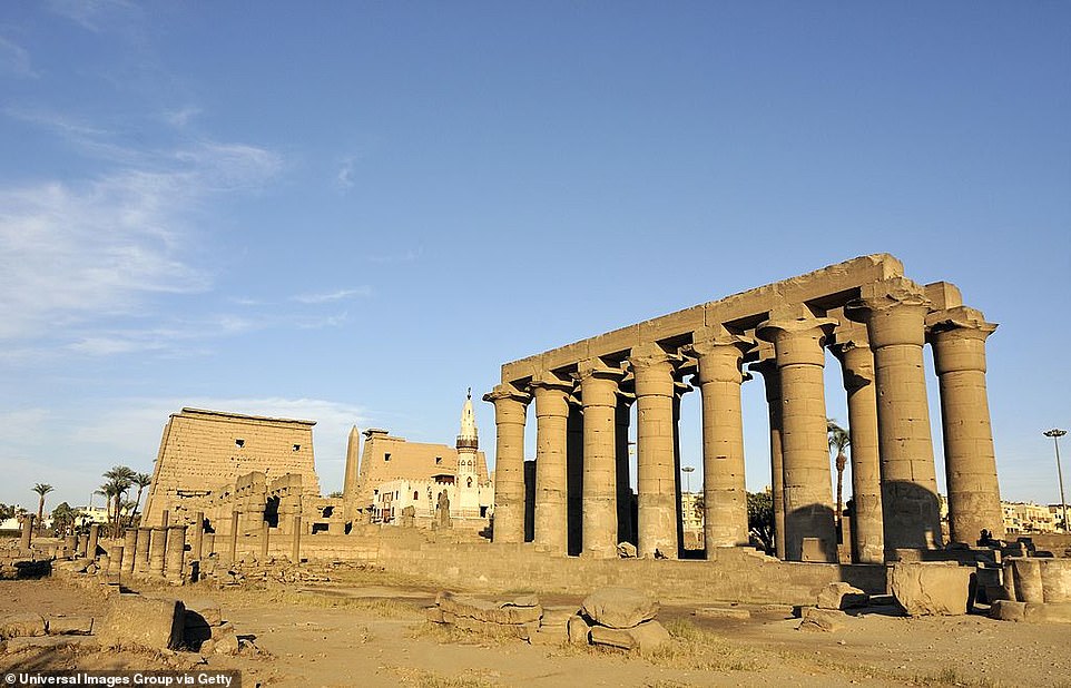 The Egyptian-German archaeological team, led by Horig Sorosian, found the colossal statues submerged in water at the funerary building, known as the 'Temple of Millions of Years