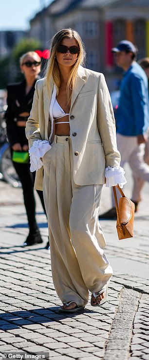 A guest at Copenhagen Fashion Week makes a case for the white bikini top