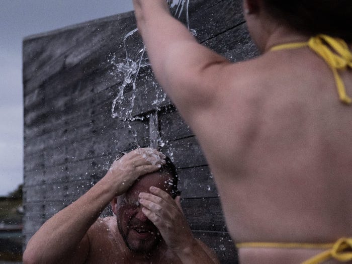 Guests playing in the water at the arctic hideaway