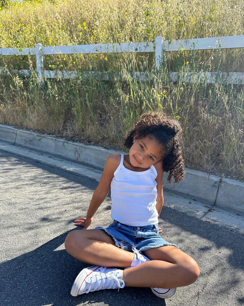 Stormi Webster showed off her model poses in new photos before her mom Kylie Jenner deleted the post from social media